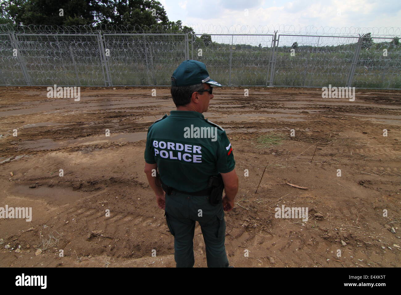 Golqm Dervent, Bulgaria. 17th July, 2014. Bulgarian Borger police officers attend near newly build 30 kms long border fence at Bulgarian-Turkey border, as they present it to the press Thursday, July, 17, 2014. The wave of refugees flocking to Bulgaria has been growing again over the past few weeks. Bulgaria builded the fence on its border with Turkey to end illegal border crossings into the country. Credit: ZUMA Press, Inc./Alamy Live News Stock Photo