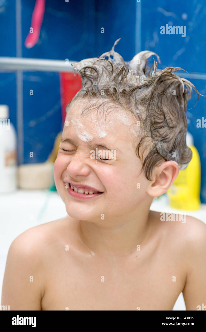 Smiling Little Boy Covered With Soap Bubbles Stock Photo Alamy