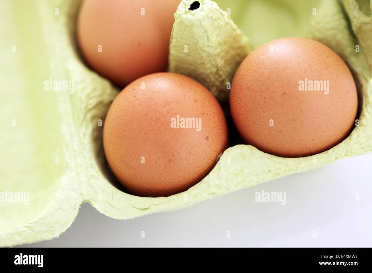 Fresh brown eggs in a carton Stock Photo