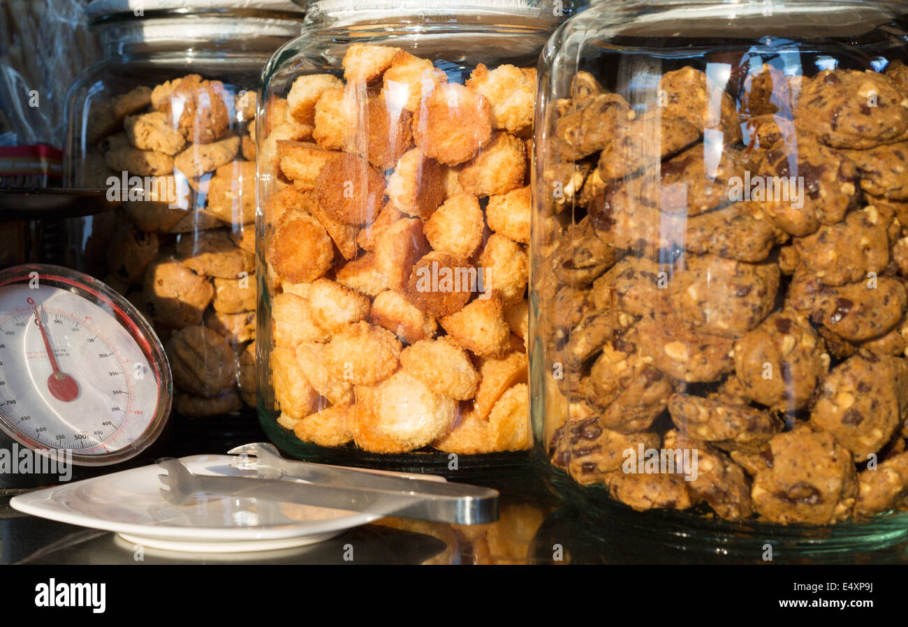 Vertical Large glass jars filled with cookies in kitchen Stock Photo - Alamy