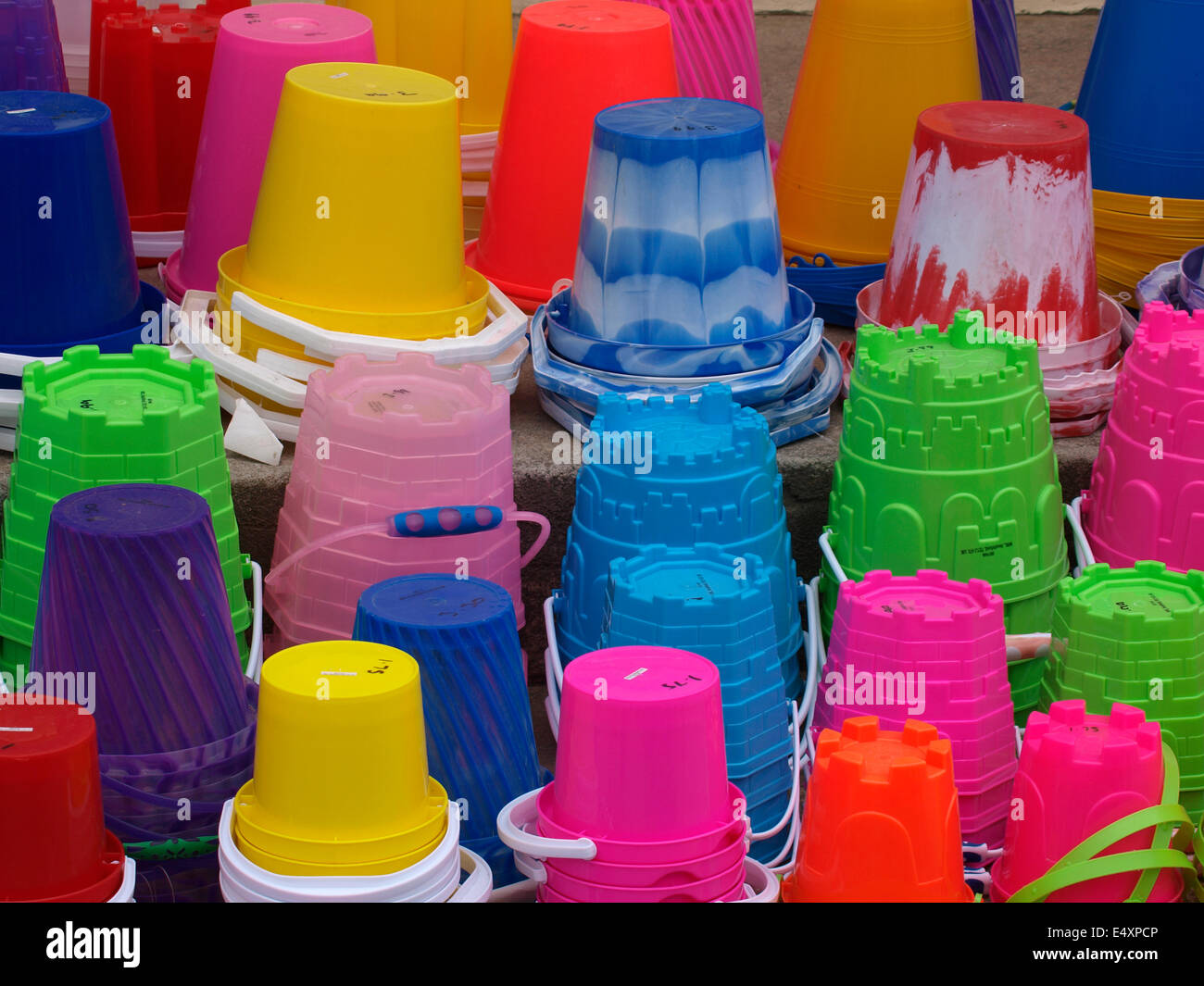Colourful beach buckets for sale, Cornwall, UK Stock Photo Alamy