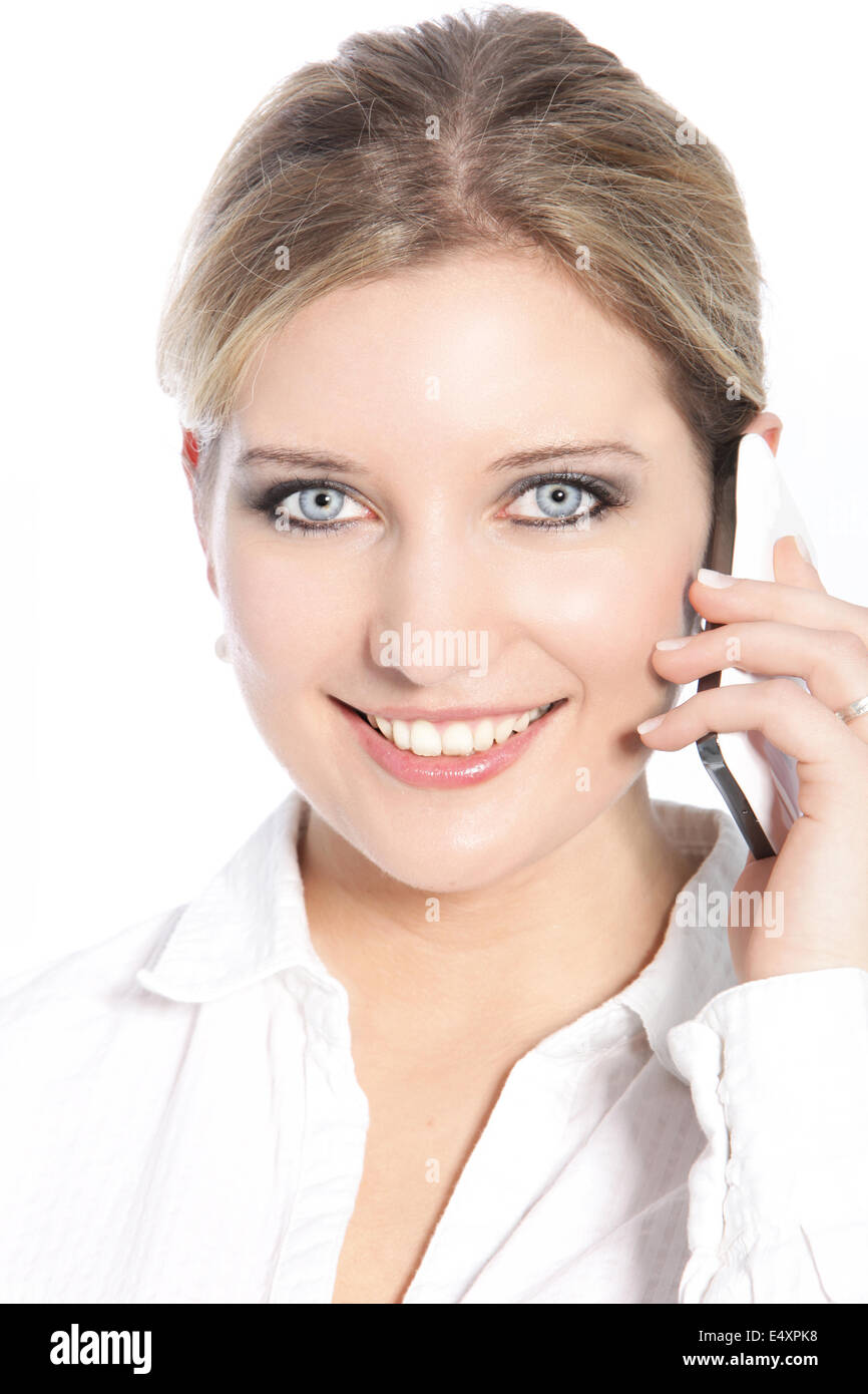 Happy woman using a mobile phone Stock Photo