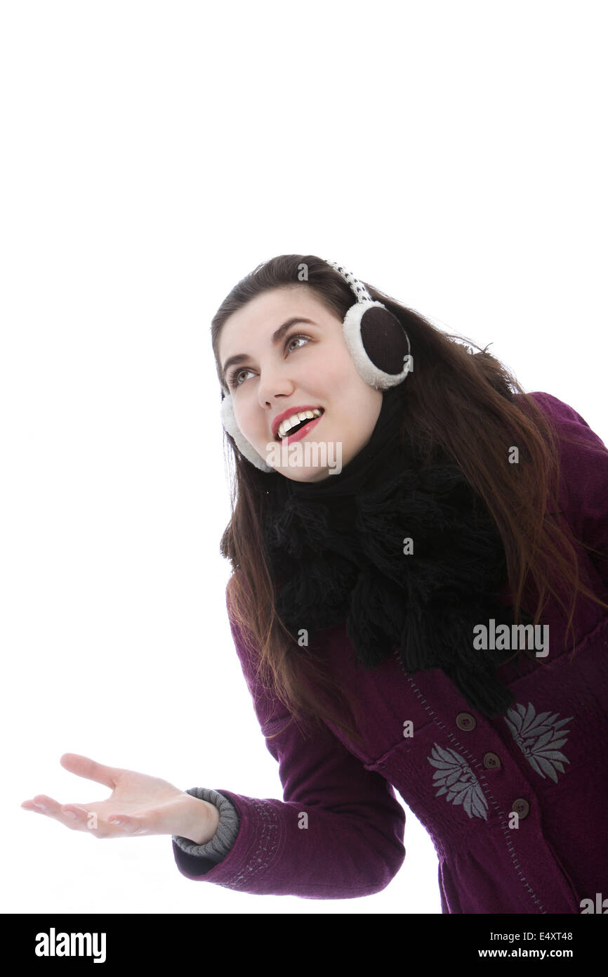 Young attractive woman wearing ear muffs Stock Photo