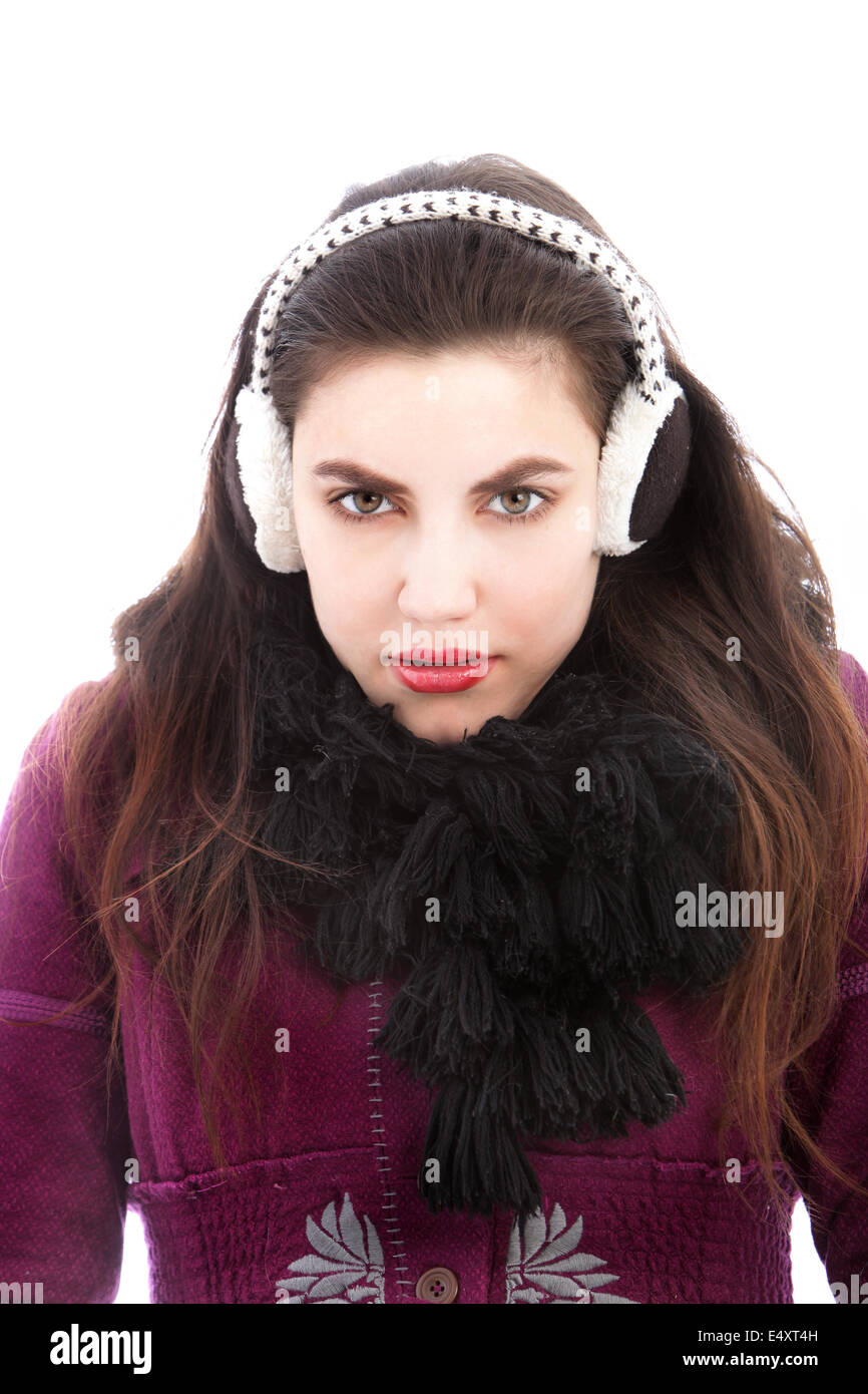 Cold woman wearing ear muffs Stock Photo