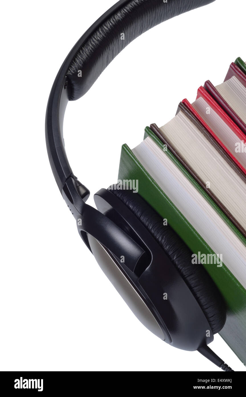 Headphones on books isolated. Stock Photo