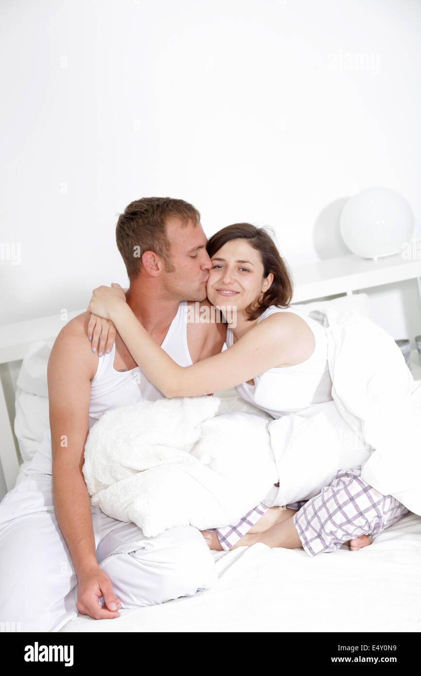 Affectionate man kissing his wife Stock Photo