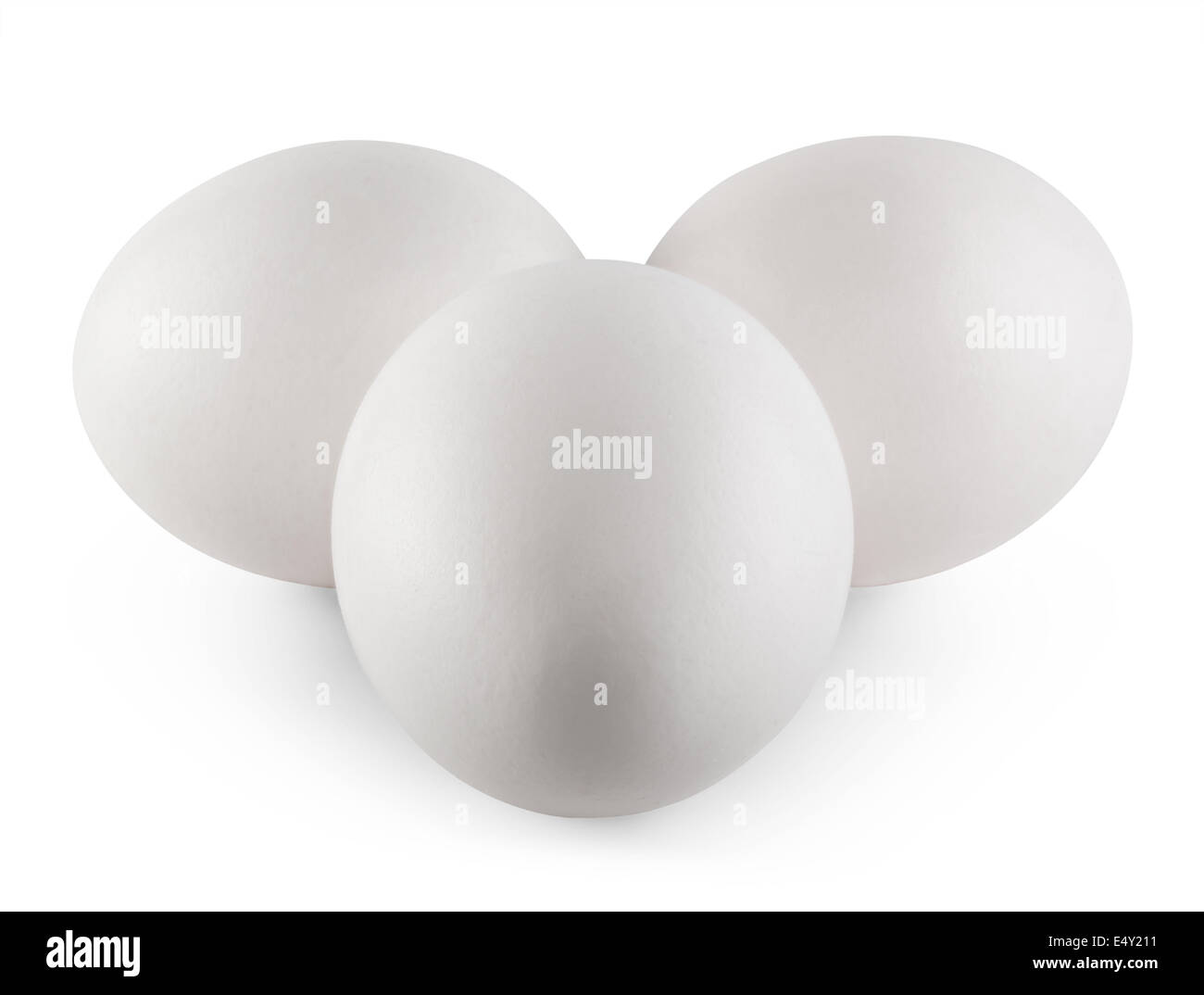 Three white eggs isolated on white. Clipping Path Stock Photo
