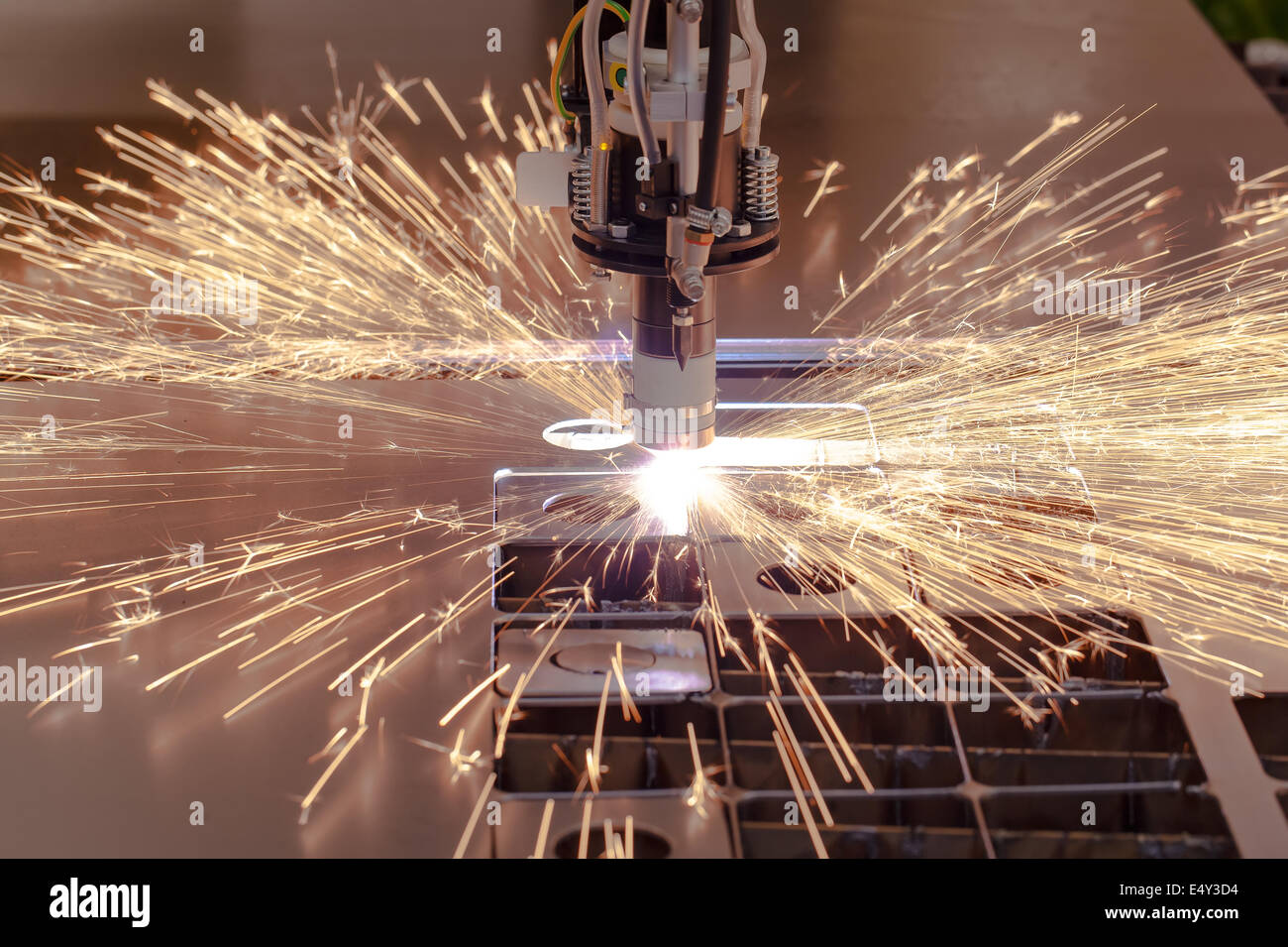 Plasma cutting process of metal with sparks Stock Photo
