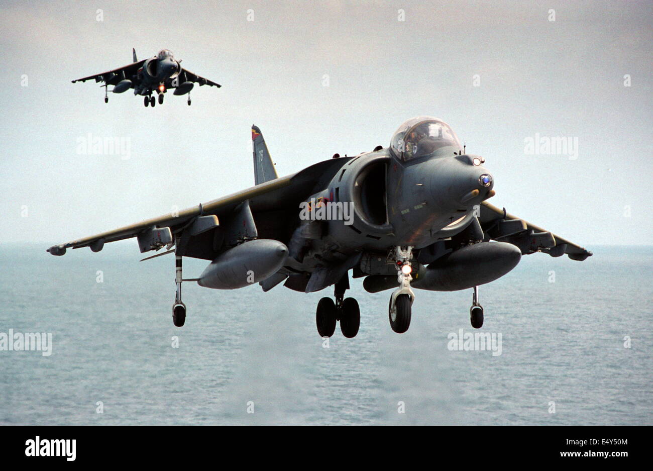 HARRIER GR7 FIGHTERS LANDING ON THE BRITISH AIRCRAFT CARRIER HMS ILLUSTRIOUS.  PHOTO:JONATHAN EASTLAND/AJAX Stock Photo