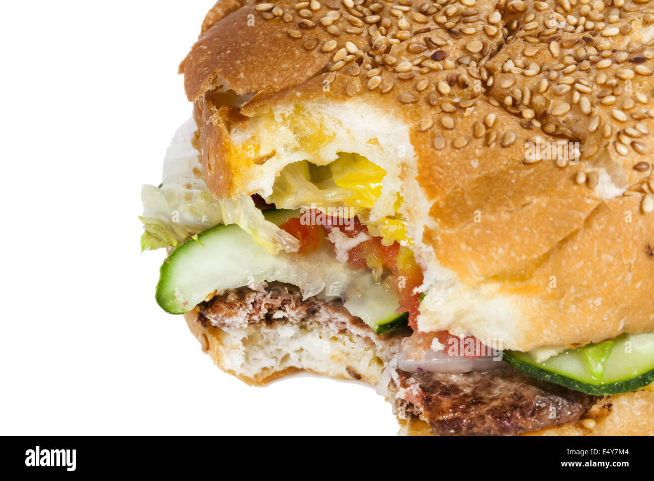Bitten burger with meat and vegetables Stock Photo