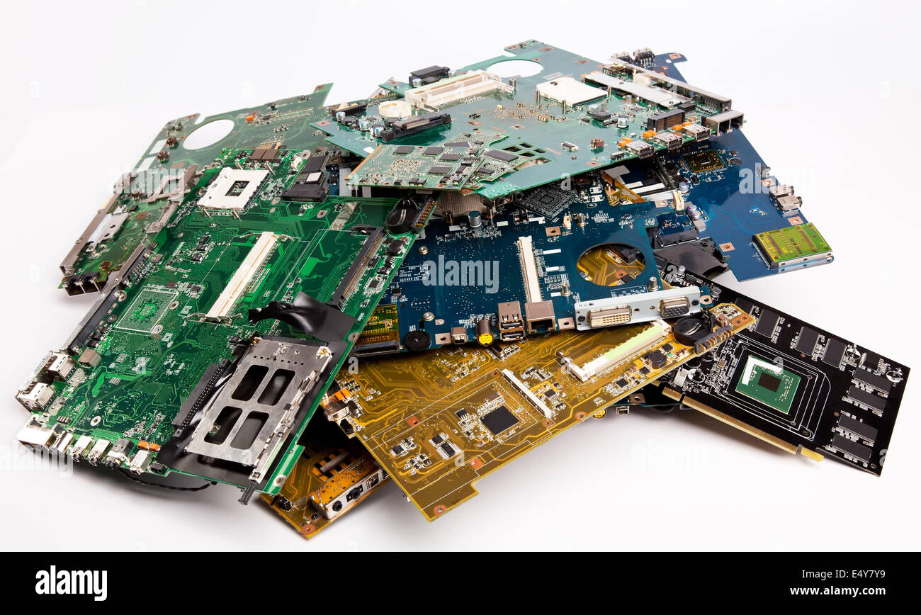 Pile of laptops mother boards Stock Photo