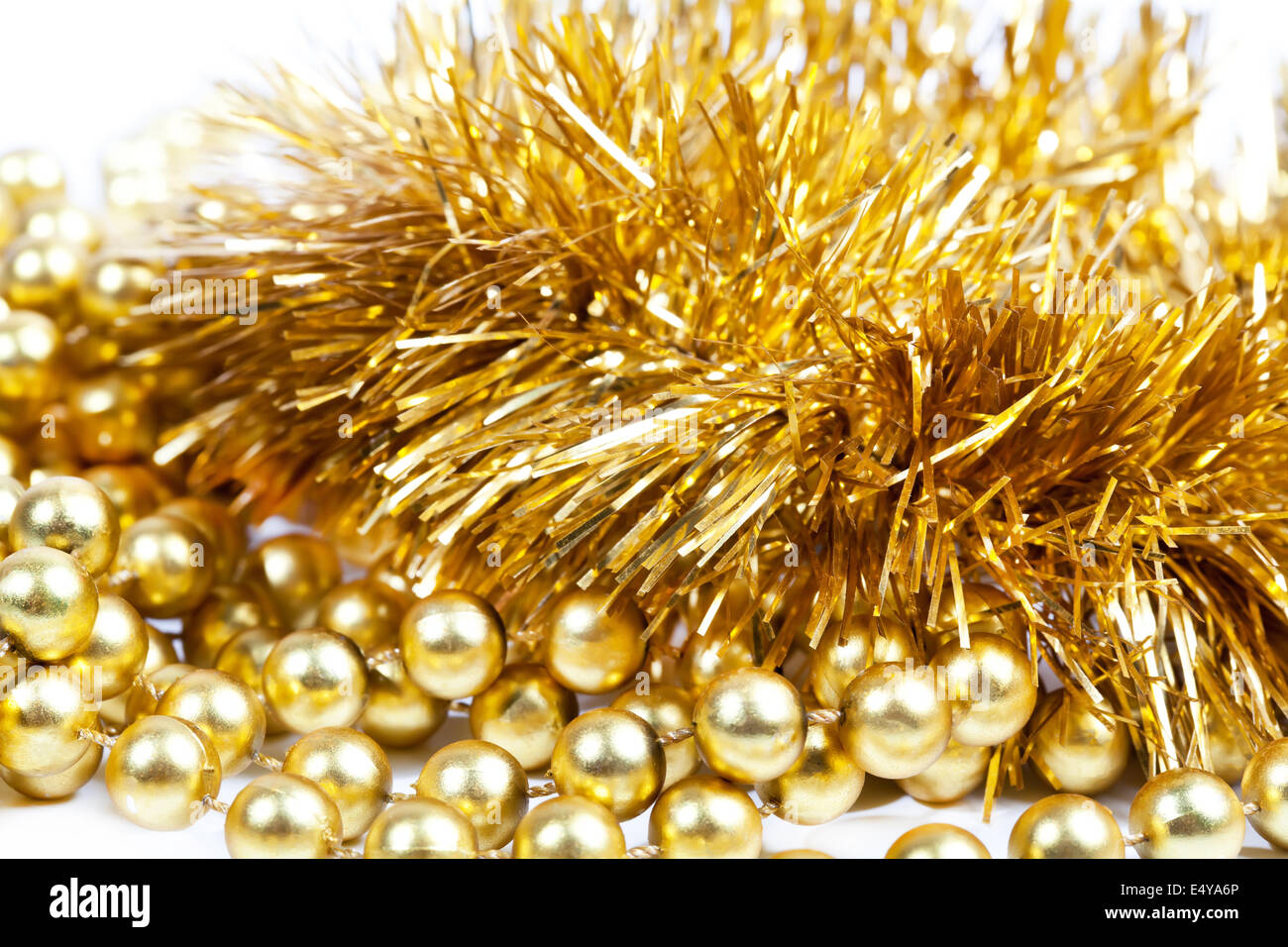 Golden tinsel and beads Stock Photo Alamy
