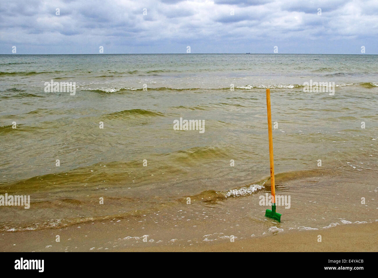 shovel on the beach Stock Photo Alamy