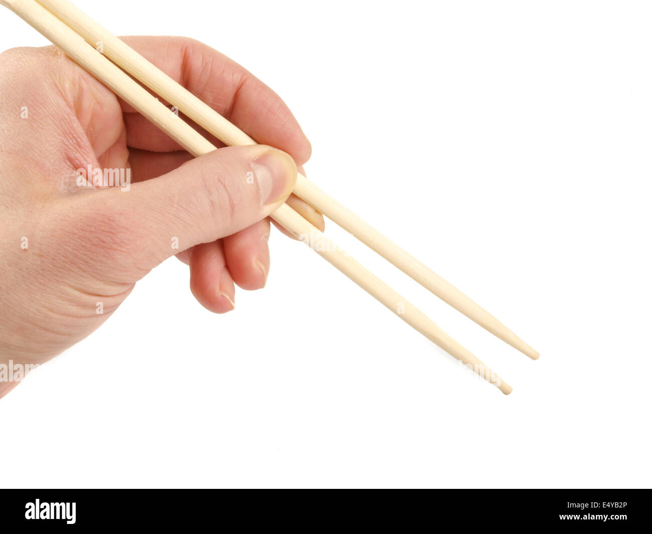 Eating with chopsticks Stock Photo