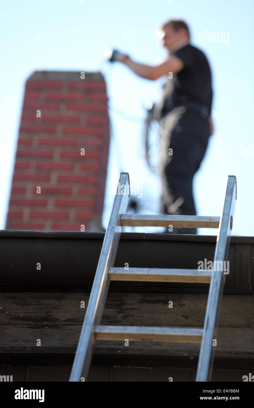 Chimney sweep at work Stock Photo Alamy