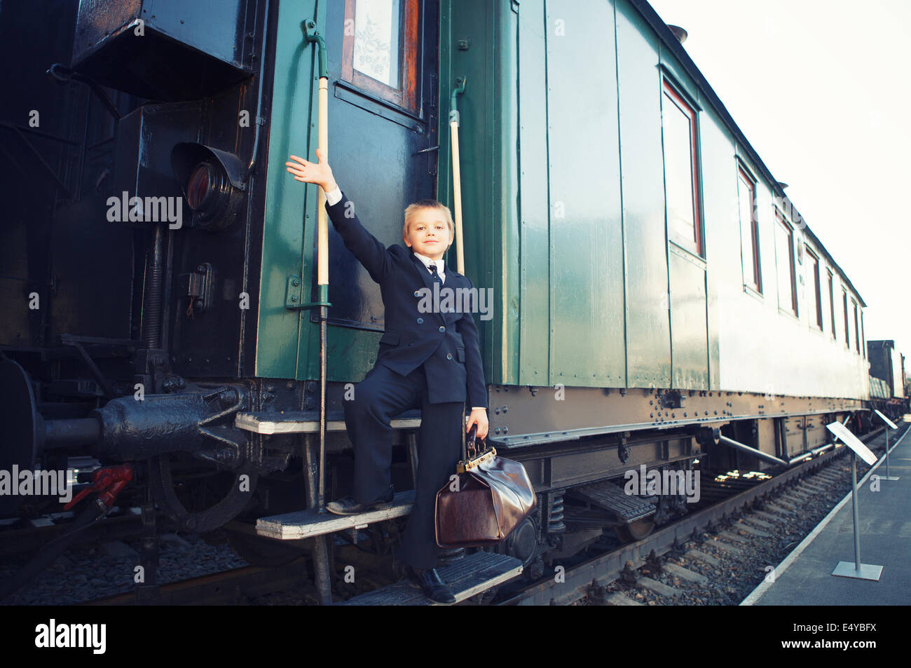 little boy with a suitcase Stock Photo Alamy