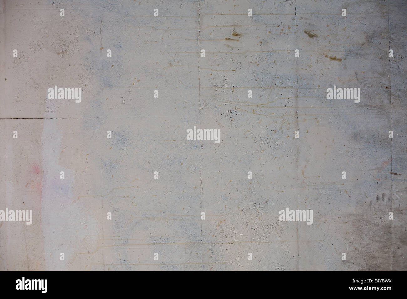 Grunge texture of concrete wall in various hues with scratches and dust Stock Photo