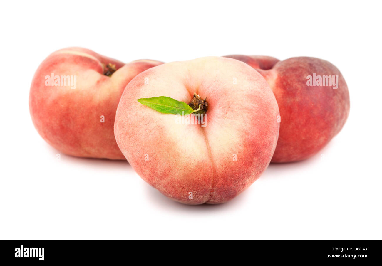 Three flat peaches Stock Photo Alamy