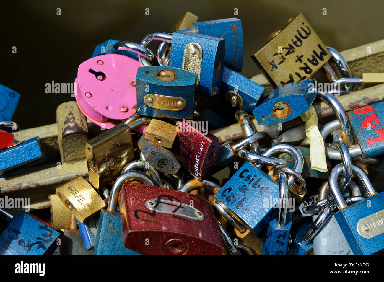 Padlocks of all sizes and types symbolizing loving commitment decorating a bridge in Prague, Czech Republic. Stock Photo