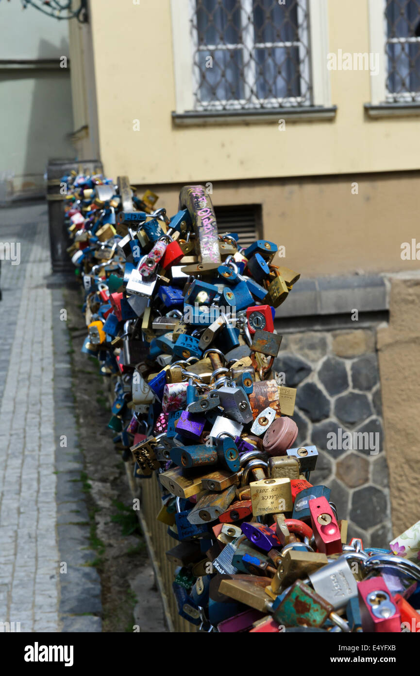 Padlocks of all sizes and types symbolizing loving commitment decorating a bridge in Prague, Czech Republic. Stock Photo