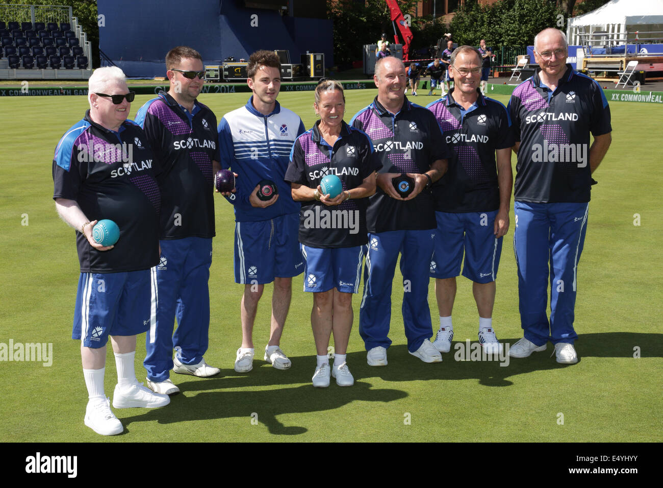 Kelvingrove Lawn Bowls Centre, Glasgow, Scotland, UK, Thursday, 17th July, 2014. Team Scotland Para-Sport Lawn Bowls Team in the venue for the 2014 Commonwealth Games Lawn Bowls Competition, left to right, Robert Conway, Michael Simpson, Kevin Wallace, Irene Edgar, Billy Allan, David Thomas and Ron McArthur Stock Photo