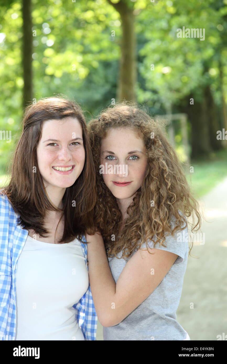 Young female friends in a park Stock Photo