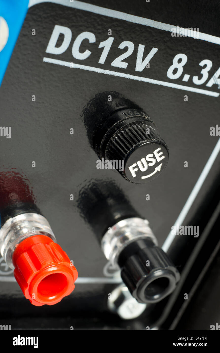 12 volt charging terminals and fuse, on a petrol driven, electricity generator. Stock Photo