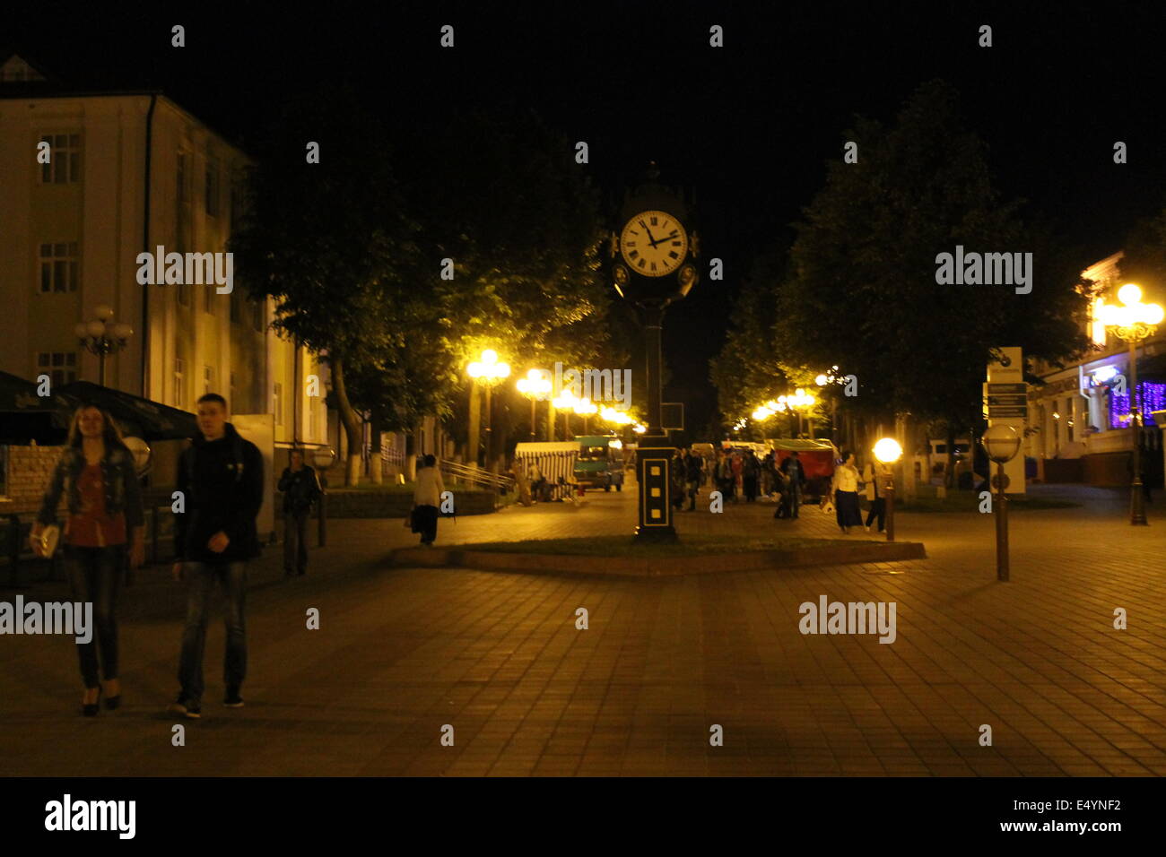 big decoration clock on the night empty city square Stock Photo