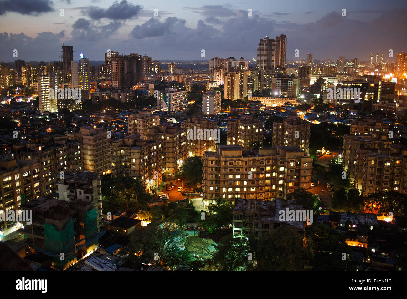 Night cityscape with modern residential buildings in Jogeshwari and Andheri West area of Mumbai, India. Stock Photo