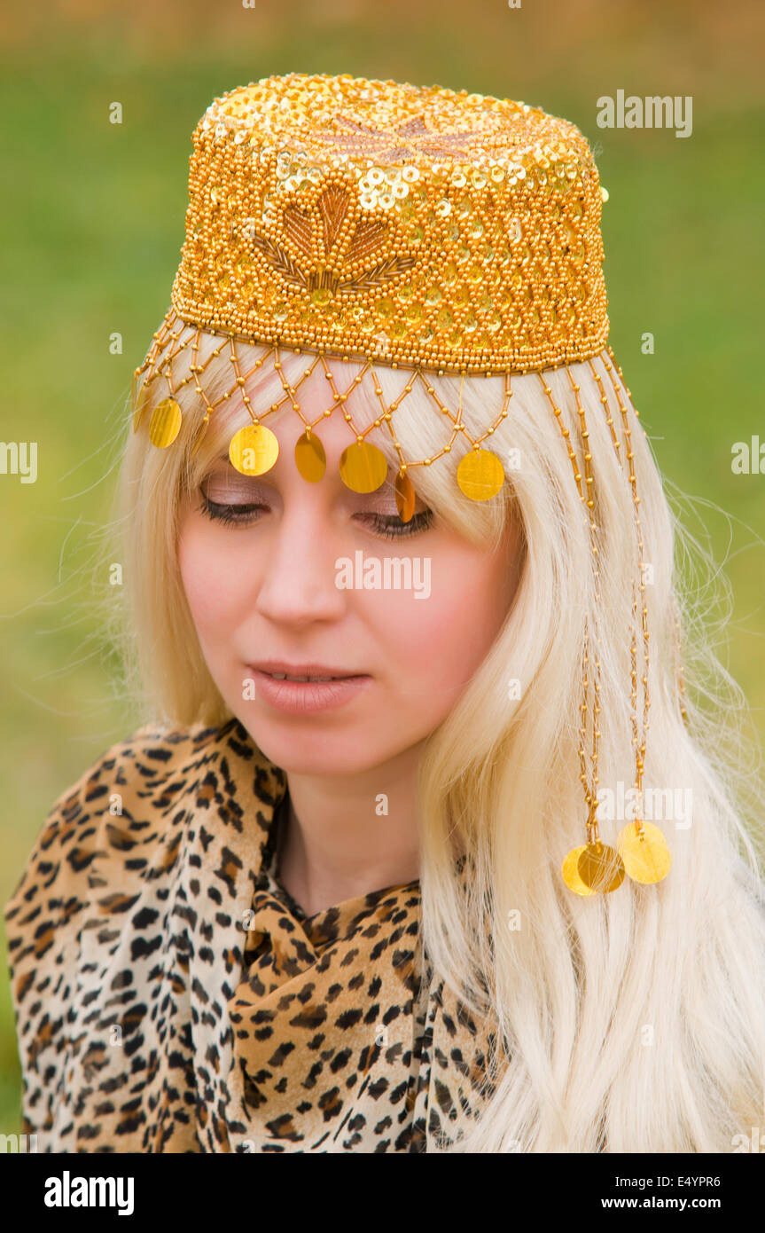 young woman with a beautiful headdress Stock Photo - Alamy