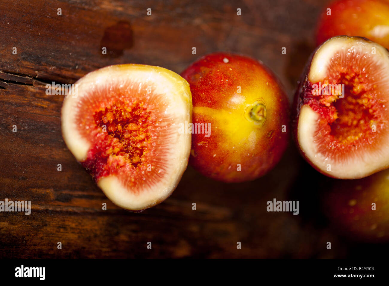 Over Ripped Figs fresh figs over old wood Stock Photo - Alamy