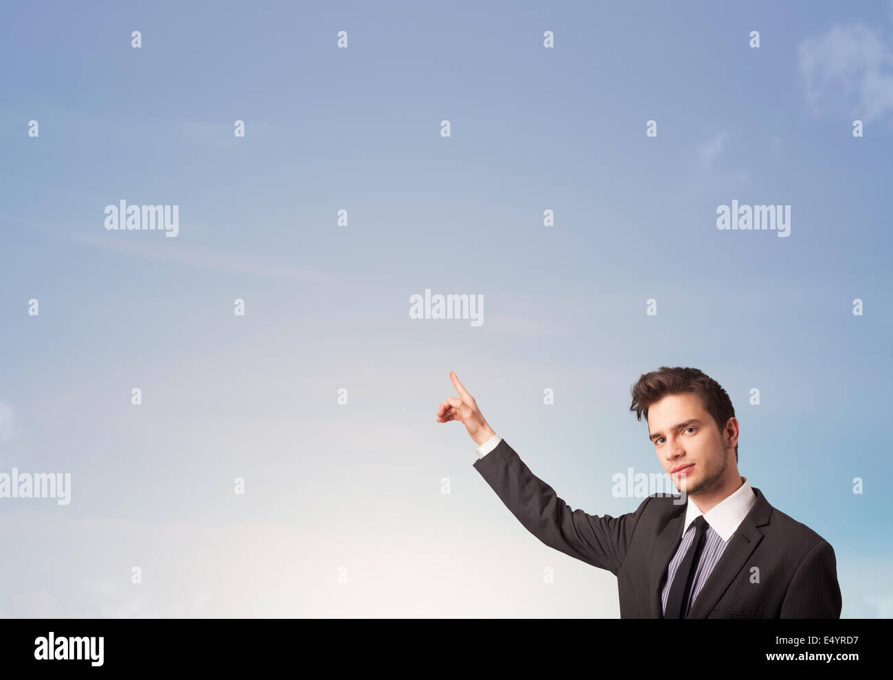 Handsome man looking at the blue sky copyspace Stock Photo - Alamy