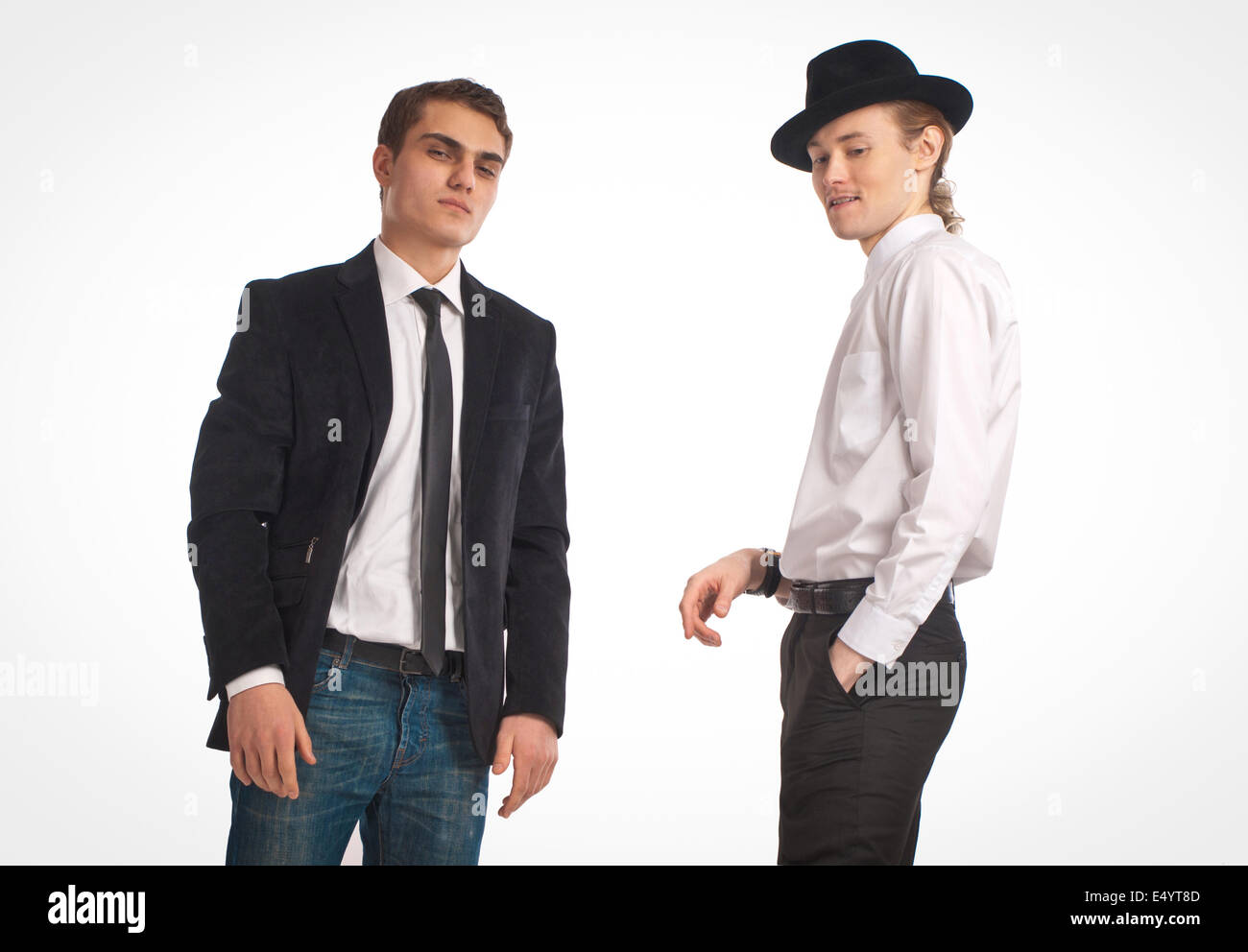 two young men on a white background Stock Photo - Alamy
