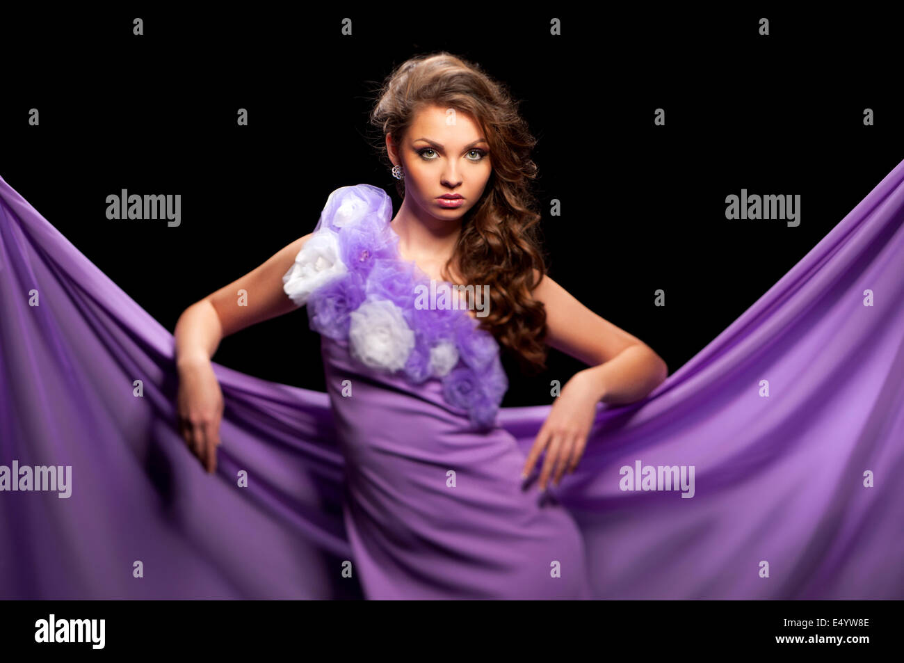 woman in the purple dress Stock Photo - Alamy
