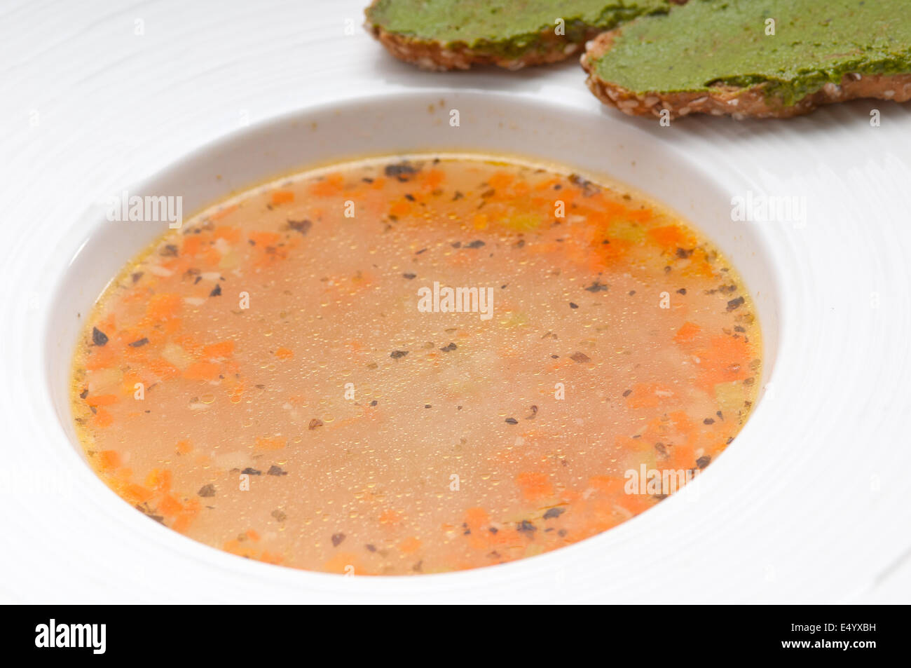 Italian minestrone soup with pesto crostini on side Stock Photo Alamy