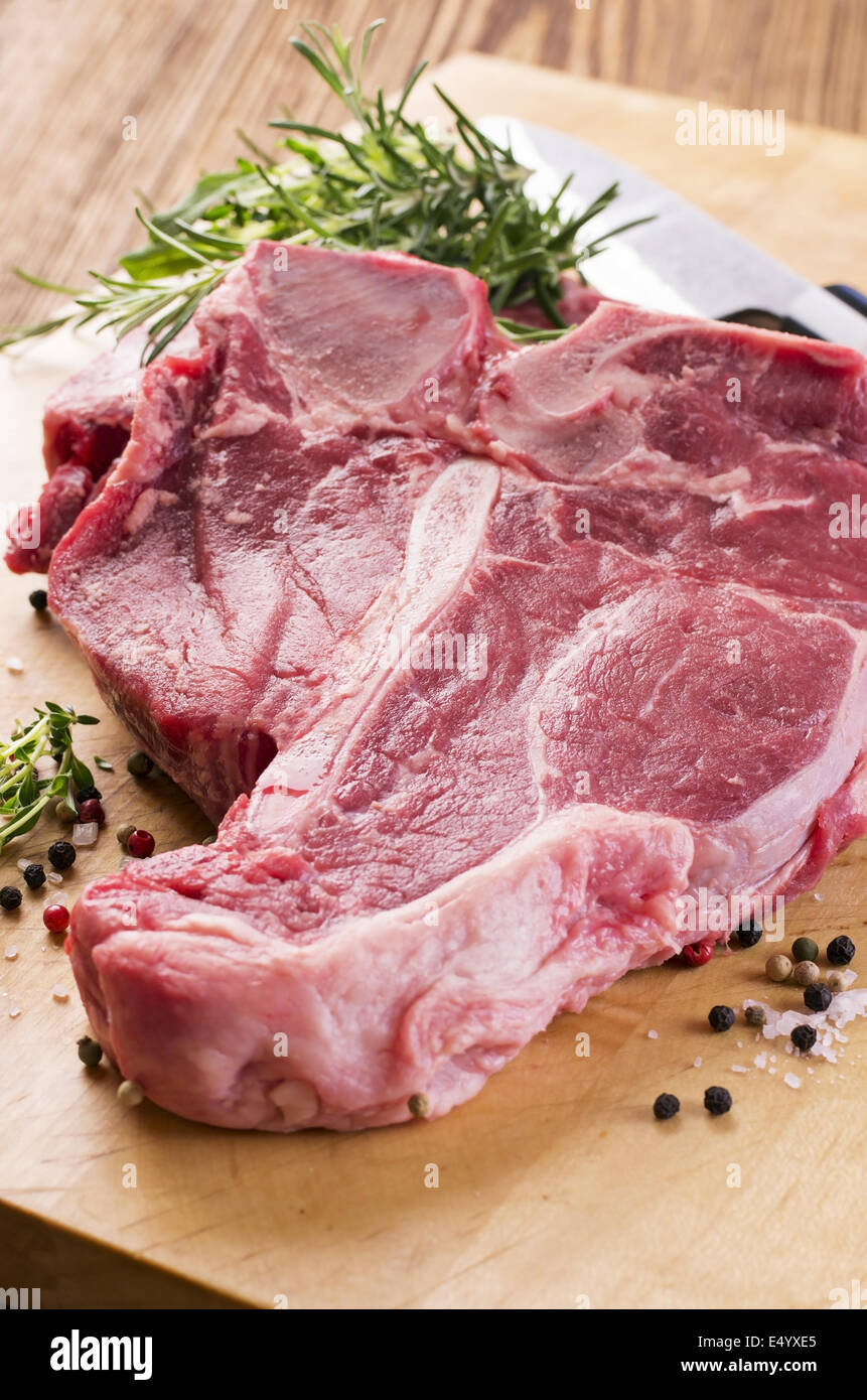 tbone steak with herbs and pepper Stock Photo Alamy