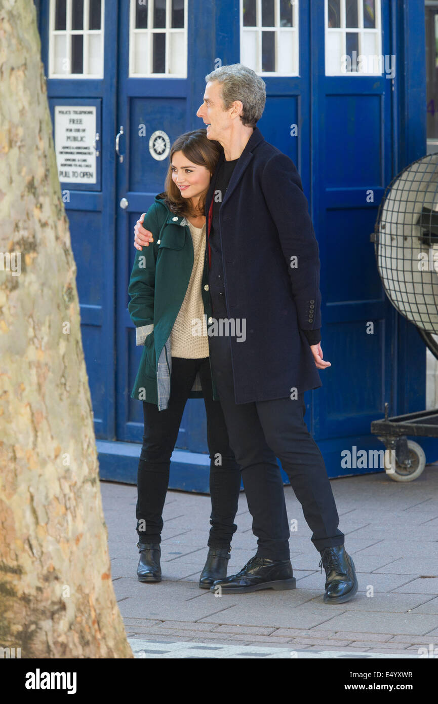 Cardiff, UK. 17th July 2014. The cast of BBC Doctor Who are spotted filming on Queen Street in Cardiff city centre. Pictured: Peter Capaldi and Jenna Coleman hugging in between takes. Credit:  Polly Thomas / Alamy Live News Stock Photo