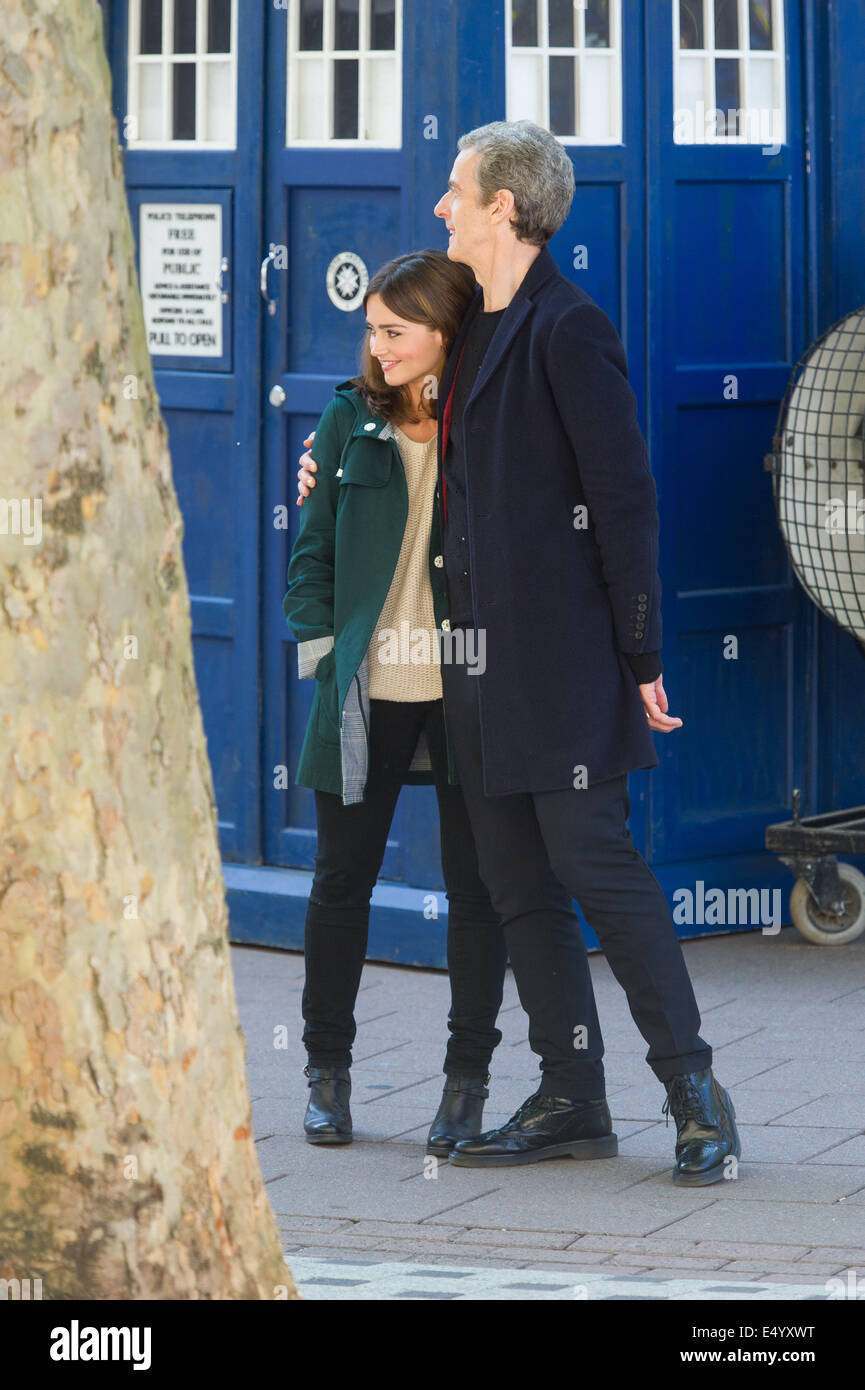 Cardiff, UK. 17th July 2014. The cast of BBC Doctor Who are spotted filming on Queen Street in Cardiff city centre. Pictured: Peter Capaldi and Jenna Coleman hugging in between takes. Credit:  Polly Thomas / Alamy Live News Stock Photo