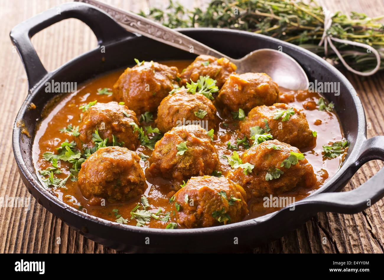 meatballs cooked in tomato sauce Stock Photo Alamy