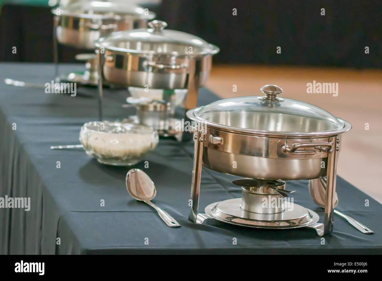 banquet table with chafing dish heaters Stock Photo