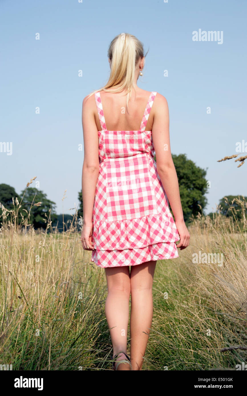 Young woman taking a walk Stock Photo - Alamy