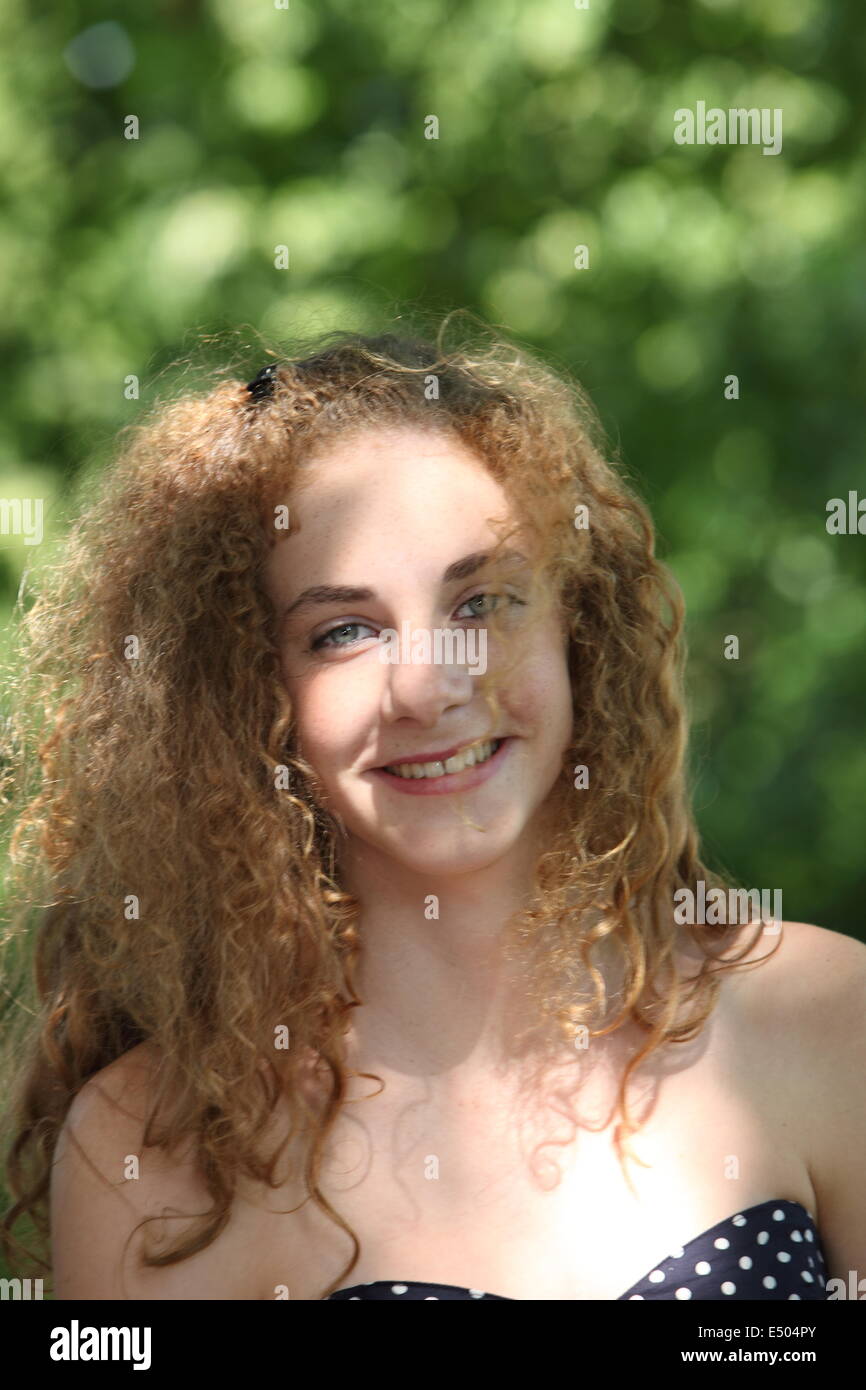 Blond curly hair woman hi-res stock photography and images - Alamy
