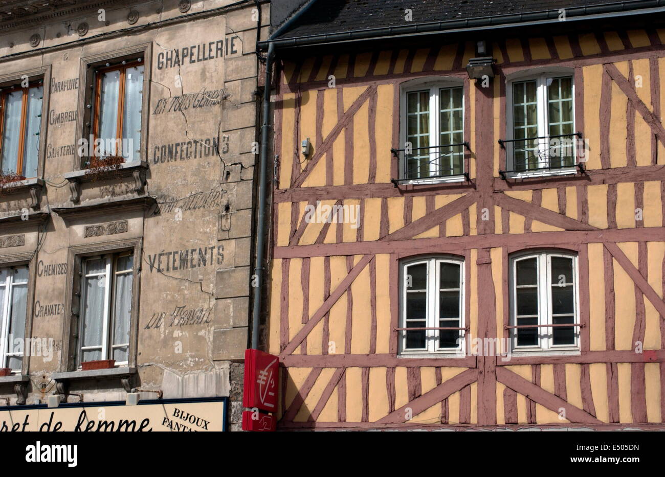 PONT DE L'ARCHE,FRANCE-OLD TIMBER FRAMED BUILDING AND OLD STYLE ADVERTISING  IN THE TOWN. PHOTO:JONATHAN EASTLAND/AJAX Stock Photo - Alamy