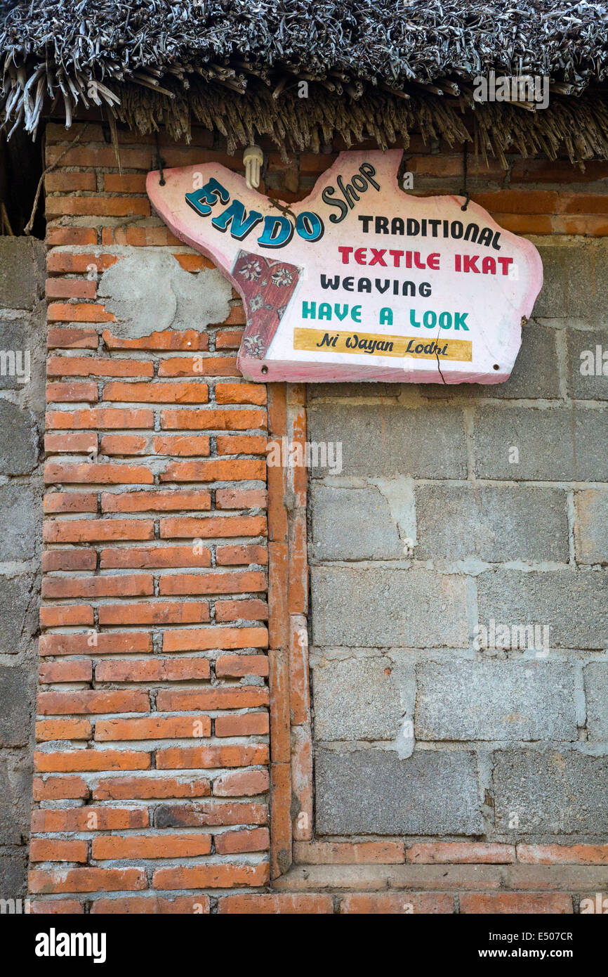 Bali, Indonesia.   Textile Shop Sign, Tenganan Village. Stock Photo