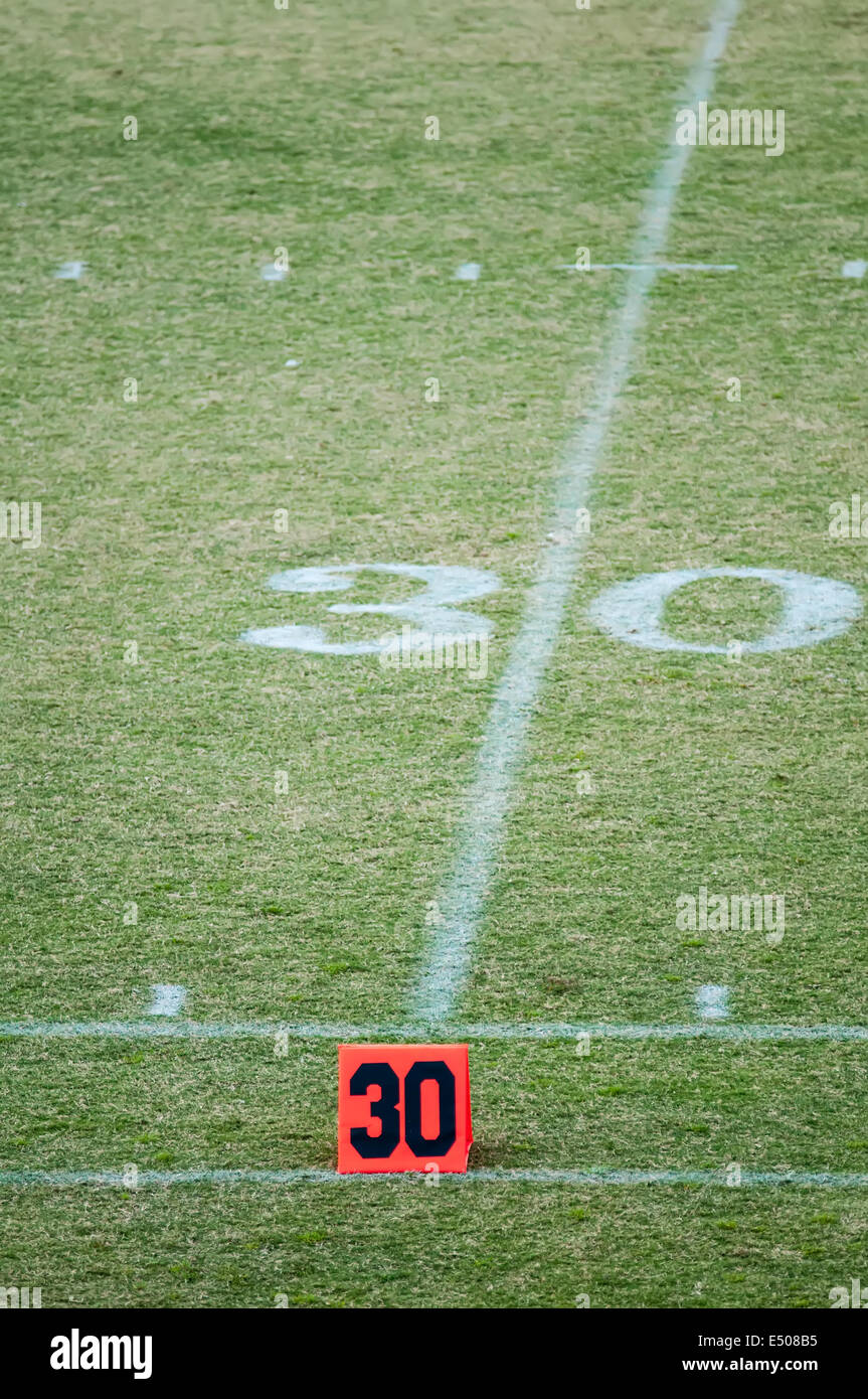 football field 30 twenty yard line marker Stock Photo Alamy