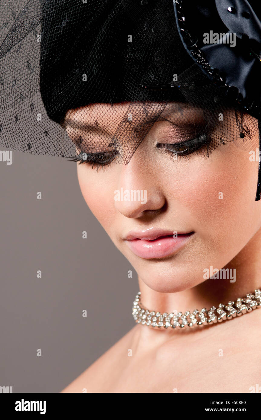 attractive woman with a beautiful headdress Stock Photo - Alamy