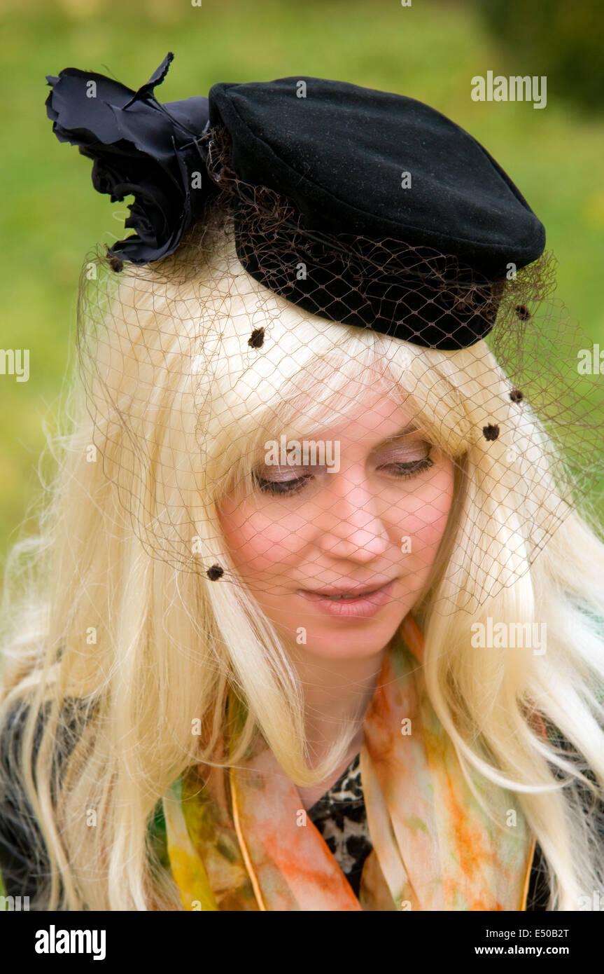 young woman with a beautiful headdress Stock Photo - Alamy