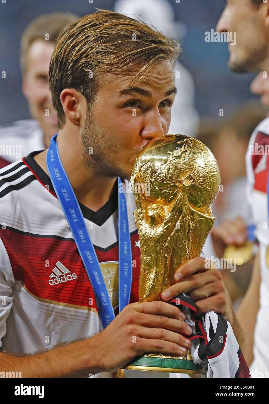 Rio de Janeiro, Brazil. 13th July, 2014. World Cup Final. Germany versus Argentina. Mario GOETZE, who scored the winning goal kisses the trophy © Action Plus Sports/Alamy Live News Stock Photo