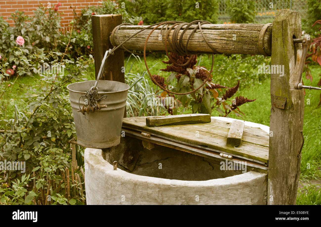 old rotten water well, rural scenery Stock Photo Alamy