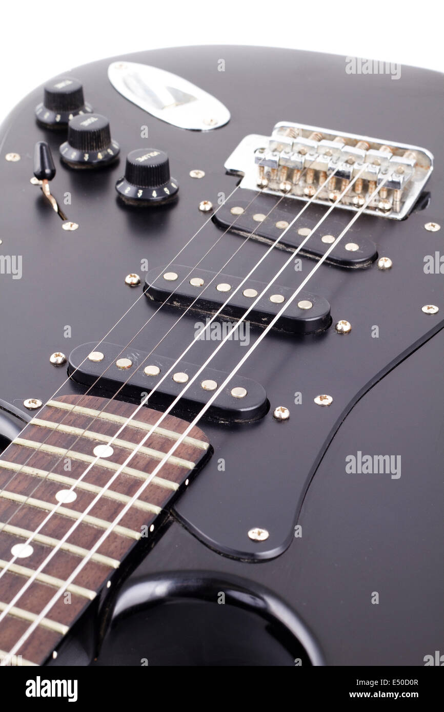 Black electric guitar on white background Stock Photo - Alamy